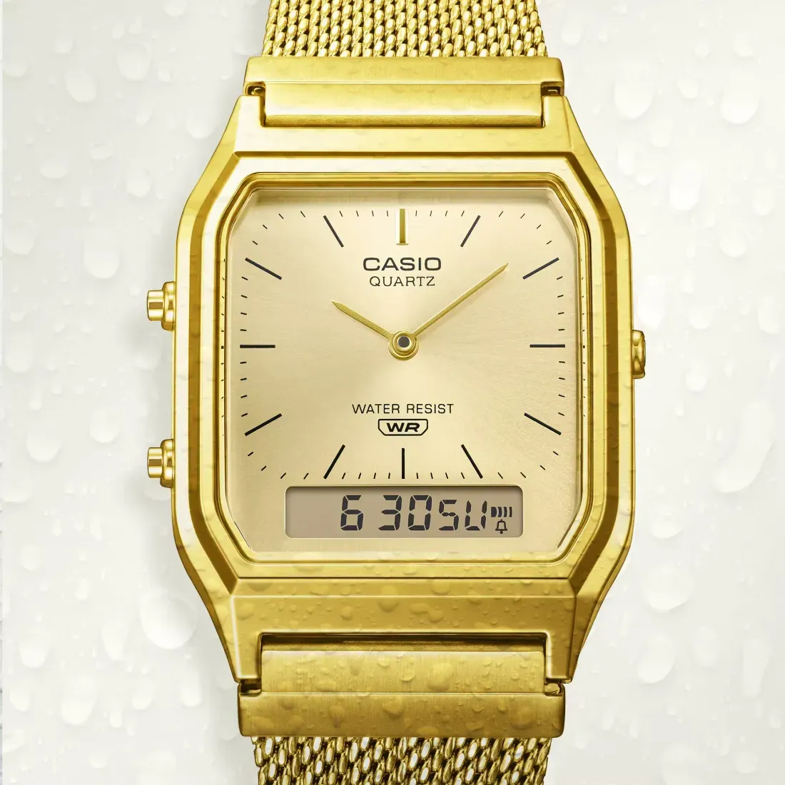 Casio AQ-230EMG-9A berdesain analog digital berbodi emas